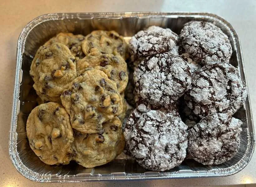 Chocolate chip and chocolate crinkle cookies in a bakery tray