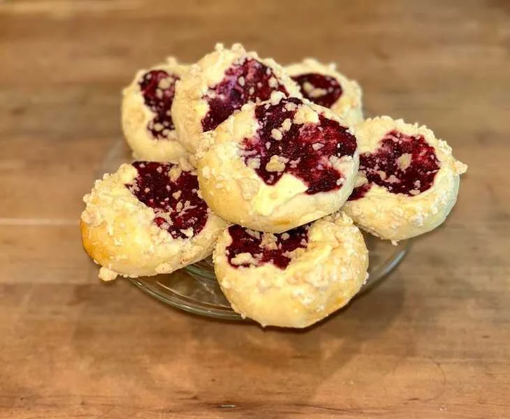 Sourdough danish filled with cinnamon vanilla cream, berry jam and golden crumble